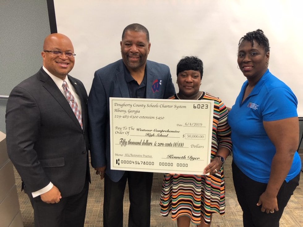Dougherty County School System supporters accept the grants. (Source: DCSS)