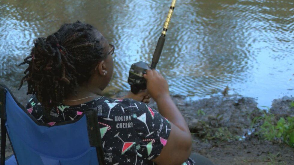 A woman spends the Labor Day holiday fishing. (Source: WALB)