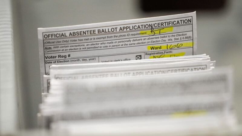 Absentee ballots are seen during a count at the Wisconsin Center for the midterm election...