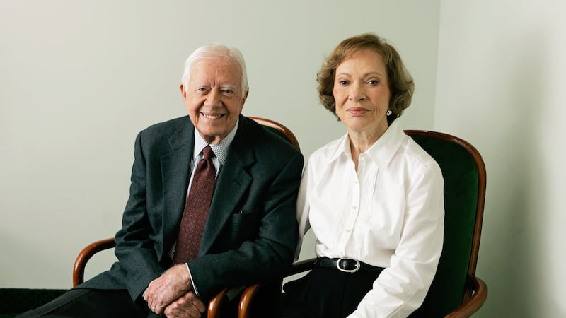 Former President Jimmy Carter and his wife Rosalynn Carter pose for a portrait during the...