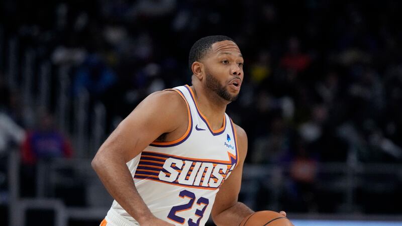 Phoenix Suns guard Eric Gordon plays during the first half of an NBA basketball game, Sunday,...