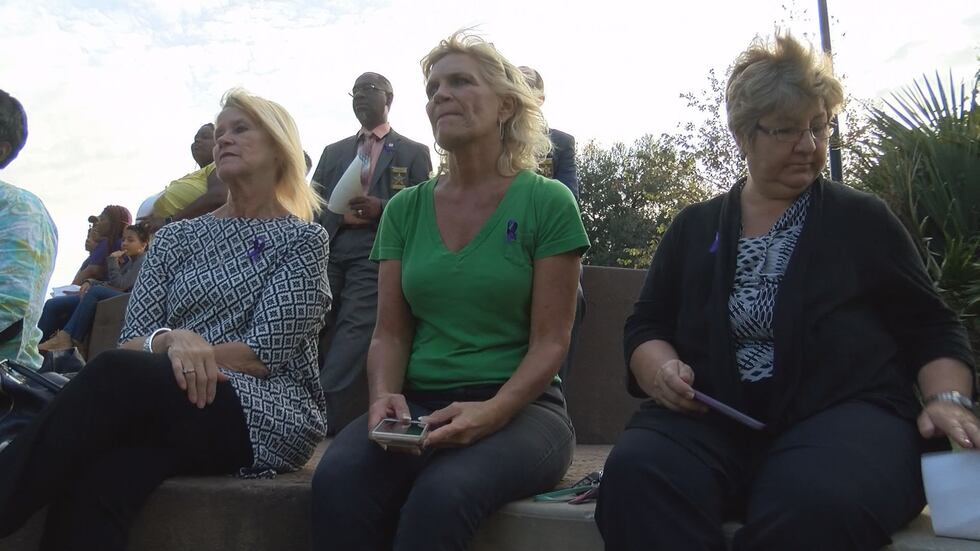 Residents kick off domestic violence awareness month with vigil. (Source: WALB)