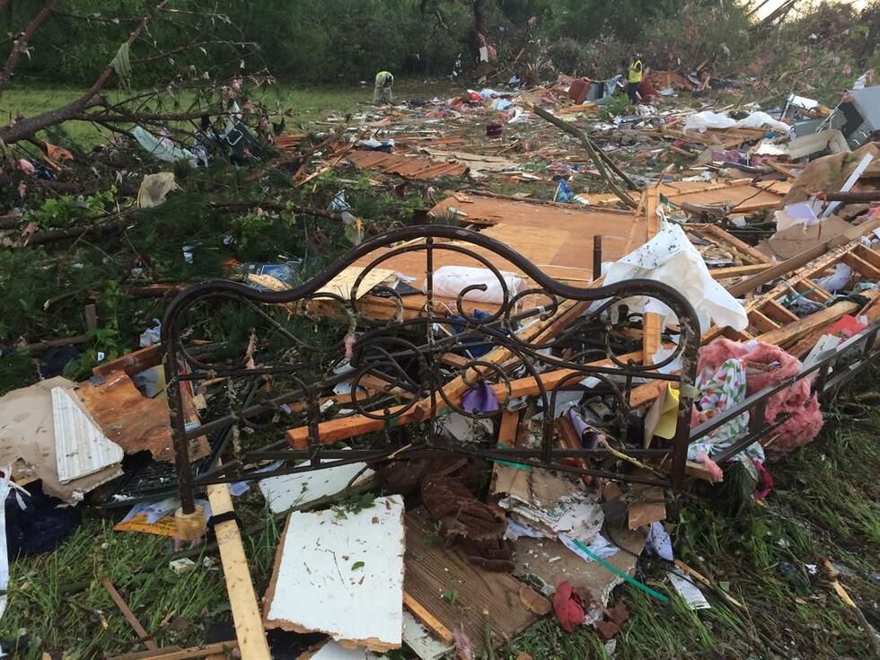 The family's belongings were left scattered across the road. (Source: WALB)