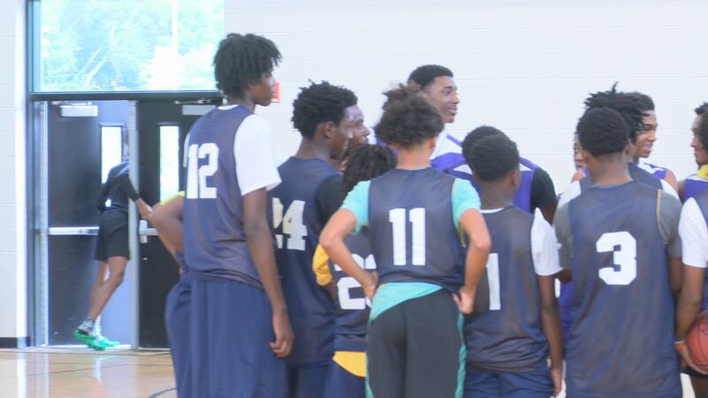 Teams huddle before the game discussing rules of the tournament