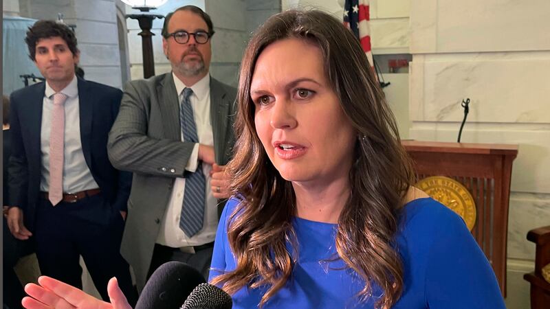 FILE - Arkansas Republican Gubernatorial candidate Sarah Sanders talks to reporters at the...