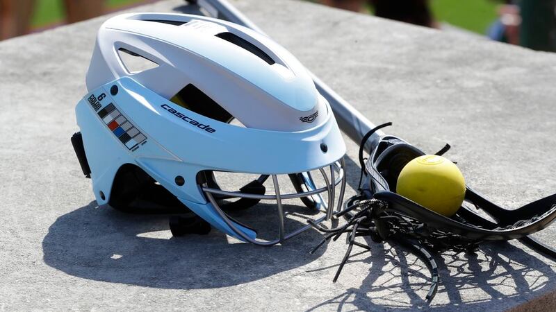 In a photo from April 26, 2017, a lacrosse helmet is displayed at the Cranbrook Kingswood...