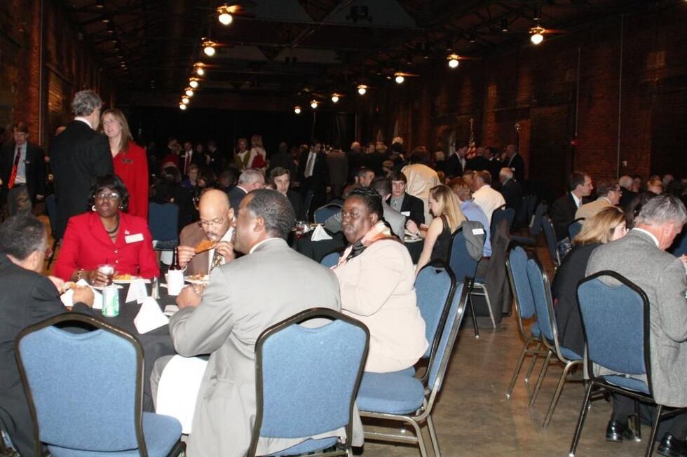 People eating and conversing at last year's Bird Supper. Source: Sementha Matthews