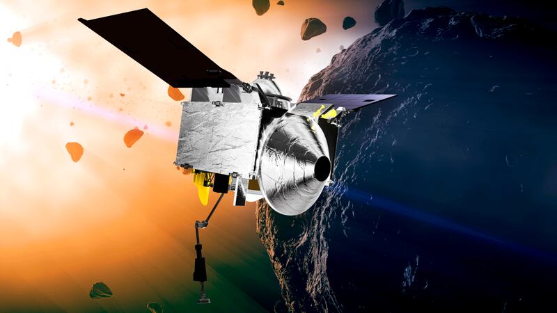 FILE - This illustration provided by NASA depicts the Osiris-Rex spacecraft at the asteroid...