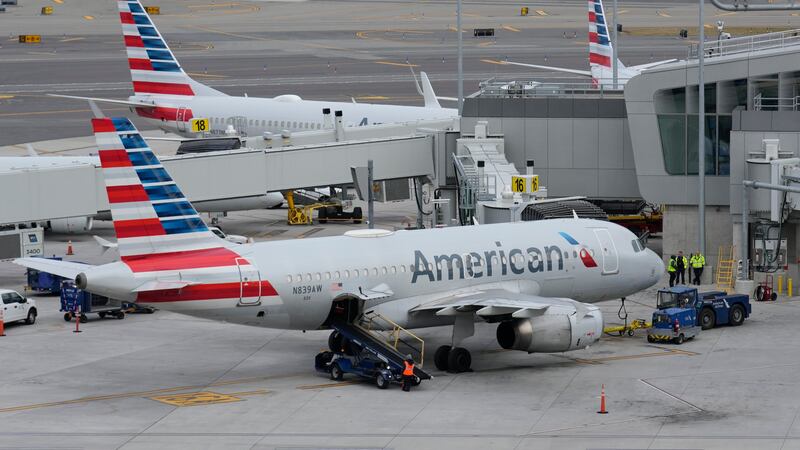 FILE - American Airlines planes sit on the tarmac at Terminal B at LaGuardia Airport, Jan. 11,...